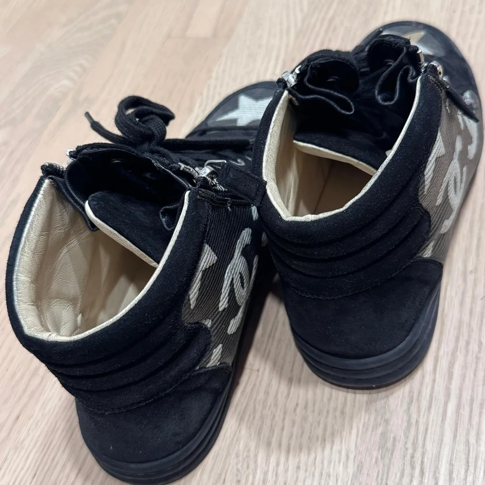 CHANEL Black High-Top Sneakers with Star Design